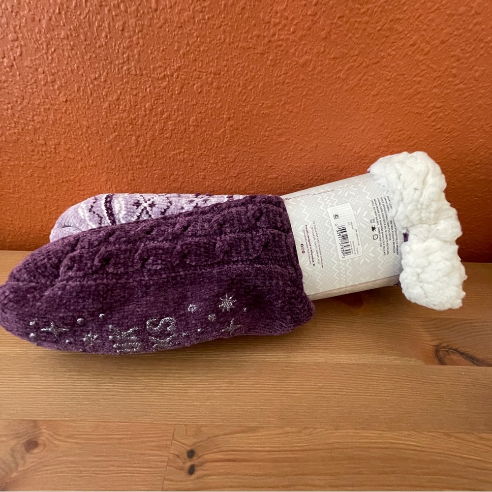 Purple and lilac Muk Luks fuzzy and warm women’s cabin socks